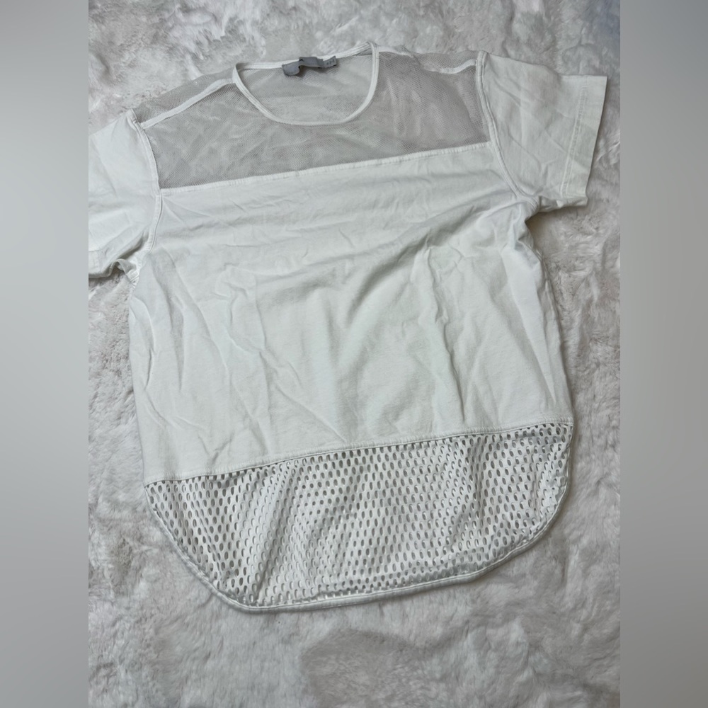 White adidas work out active shirt with mesh on the top and bottom. - Picture 1 of 8